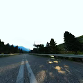 Swing Door Along Country Road With Trees Guardrails Billboard And Mountains