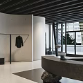 Minimalist Modern Clothing Store Interior With Gray Counter And Hanging Clothes