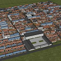Aerial View of Neatly Arranged Red Roof Houses with Central White Building and Green Grassland