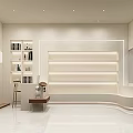 Minimalist Specialty Store Interior With White Display Walls Bookshelves And Indoor Plant