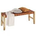 Cozy Wooden Bench with Woven Seat Light Colored Blanket Gray Brown Pillows
