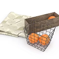 Metal Mesh and Brown Storage Baskets with Oranges and Leaf Patterned Cloth