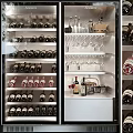 Stylish Wine Cabinet With Neatly Arranged Wine Bottles And Hanging Glasses
