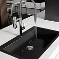 Modern Kitchen Black Sink With White Marble Countertop And Faucet Water Flow
