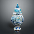 Blue And White Ceramic Sculpture Jar With Intricate Carved Patterns And Decorative Lid