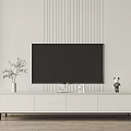 Modern White TV Stand With TV Vase And Decorative Items On Vertical Striped Wall