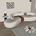 Cozy Modern Interior Design With Beige Curved Irregular Shaped Sofa And Side Table Wall Art