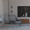 Gray Upholstered Accent Chair Metal Legs In Modern Interior With Side Table And Branch Vase
