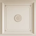 Interior White Background Wall With Central Circular Decorative Pattern And Ornate Border