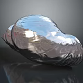 Shiny Silver Metallic Shell With Reflective Surface On Black Background