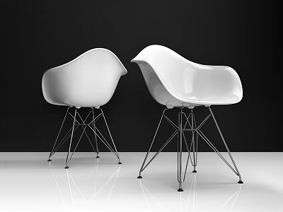 Two White Modern Leisure Chairs with Sleek Metal Legs in Minimalist Black and White Setting 3d model