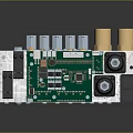 Computer Circuit Board Featuring Green PCB Electronic Components Black Capacitors White Labels and Connectors