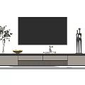 Modern TV Stand with Flat Screen TV Green Plant Vase Fruit Bowl and Sculpture Decor