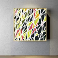 Colorful Geometric Abstract Painting With Triangles Polygons And Yellow Frame On Wall