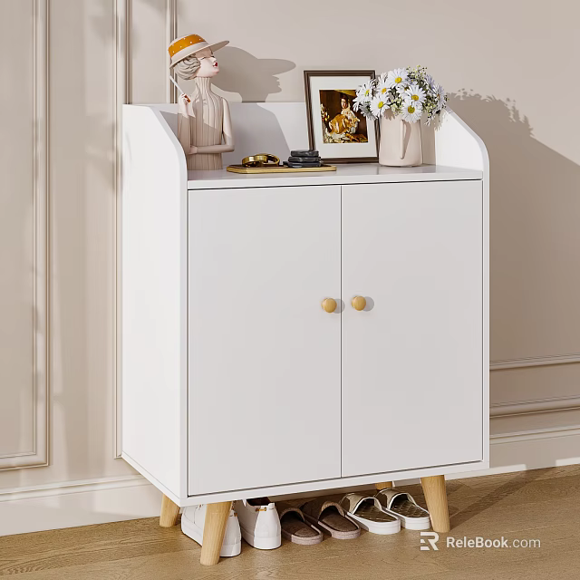 White Double Door Shoe Cabinet With Gold Knobs Wooden Legs And Decorative Items 3d model 