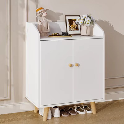 White Double Door Shoe Cabinet With Gold Knobs Wooden Legs And Decorative Items 3d model