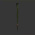 Antique Green Patinated Metal Artifact With Slender Sharp Tip And Rustic Surface Texture