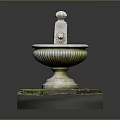 Traditional Stone Fountain With Decorative Finial And Mossy Square Base