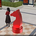 Garden Landscape in Front of White Building with Green Trees Shrubs Red Sculpture and People