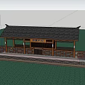 Traditional Roofed Railway Station With Platform Green Plants And People