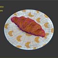 Golden Croissant On White Plate With Orange Croissant Patterns