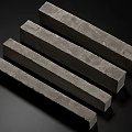 Four Gray Long Rectangular Columns With Textured Surface On Black Background