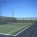Outdoor Tennis Court With Green Surface White Lines Fences Streetlights And Net For Fitness