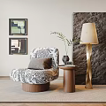 Black And White Patterned Single Sofa With Side Table Lamp Plant And Wall Art 3d model