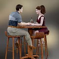 Couple Dating And Having Drinks At Table With High Stools