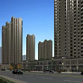 Bustling Commercial Street with High Rise Buildings Shops Pedestrians Cars and Evening Streetlights