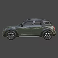 Olive Green Mini Countryman SUV With Black Roof Stripes UK License Plate And Black Wheels