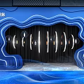 Blue Wavy Display Space Design With Hanging Round Lights And Curved Lines