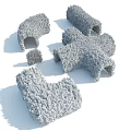 Trimmed Shrubs in Various Puzzle Piece Shapes for Creative Garden Design