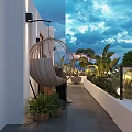 Modern Cozy Residential Terrace With Hanging Chair Lush Plants And Stunning Sea View At Dusk