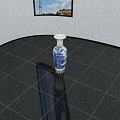 Blue And White Decorative Vase With Landscape Floral Patterns On Dark Tiled Floor