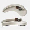 Unique Curved Sofa Design With Beige Upholstery And Brown Gray Pillows