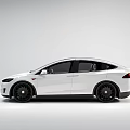 White Tesla Model X Electric SUV With Black Wheels And Modern Exterior Design