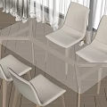 Glass Top Dining Table Set with Beige Chairs and Wooden Legs in Bright Room