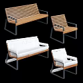 Ground Furniture Collection Featuring Wooden Benches And White Cushioned Chairs With Metal Frames
