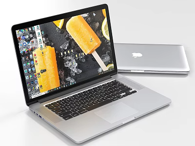 Open Silver Apple Laptop Displaying Ice Pop Image On Screen With Closed Laptop 3d model