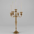 Classical Golden Candelabra With Multiple Arms And White Candles Elegant Decorative Design