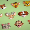 Colorful Cartoon Animal Heads Collection with Various Animals on Green Background