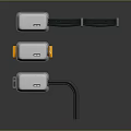 Three Contemporary Electrical Control Devices With Gray Bodies Orange Accents And Connection Cables