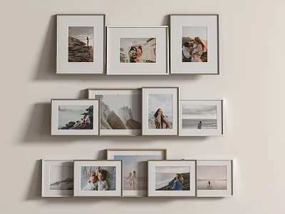 Multiple Photo Frames With Family Photos Arranged On White Wall 3d model
