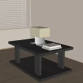Modern Coffee Table With Black Tabletop Metal Base Table Lamp And Books