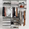 Stylish Organized Clothes Hanging On Hangers With Shoes Bags And Shelves