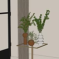 Brown Cylindrical Spherical And White Stacked Vases With Green Foliage On Glass Table