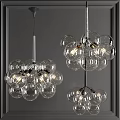 Modern Glass Ball Chandelier with Multiple Transparent Globes and Metal Frame Design Illuminated