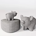 Gray Upholstered Round Sofa Stool With Small Pig Shaped Stools And Decorative Design