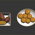 Fresh Purple and Yellow Sweet Potatoes in Square Bowl with Yellow Balls on Round Plate